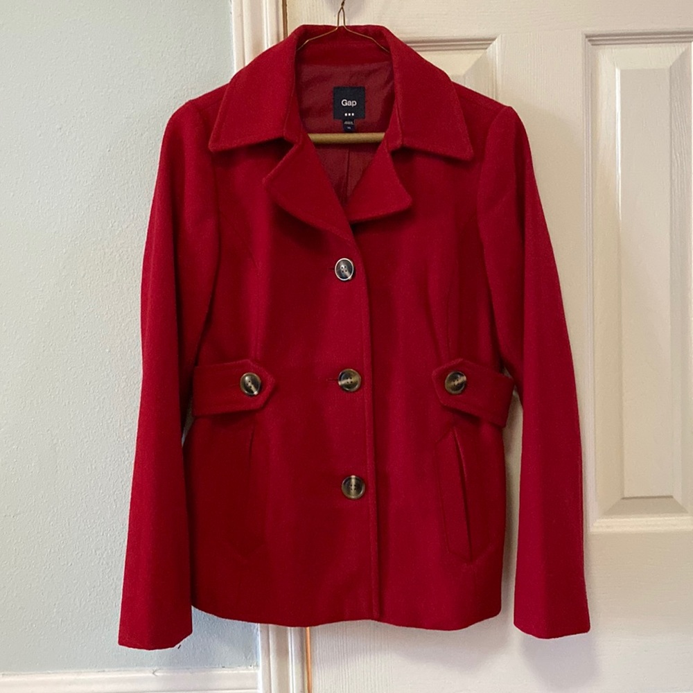 Gap pea coat. Hits at the hip.
